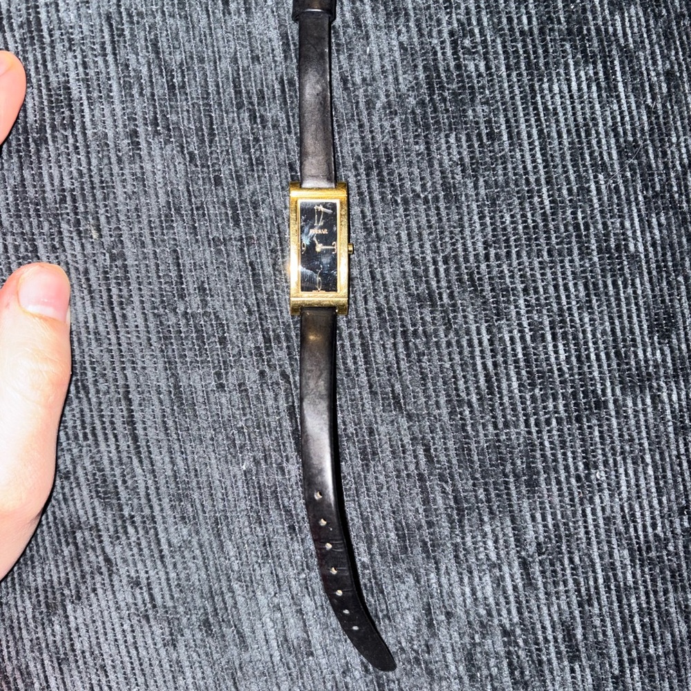 Vintage Pulsar ladies' watch features a gold-tone rectangular case needs battery